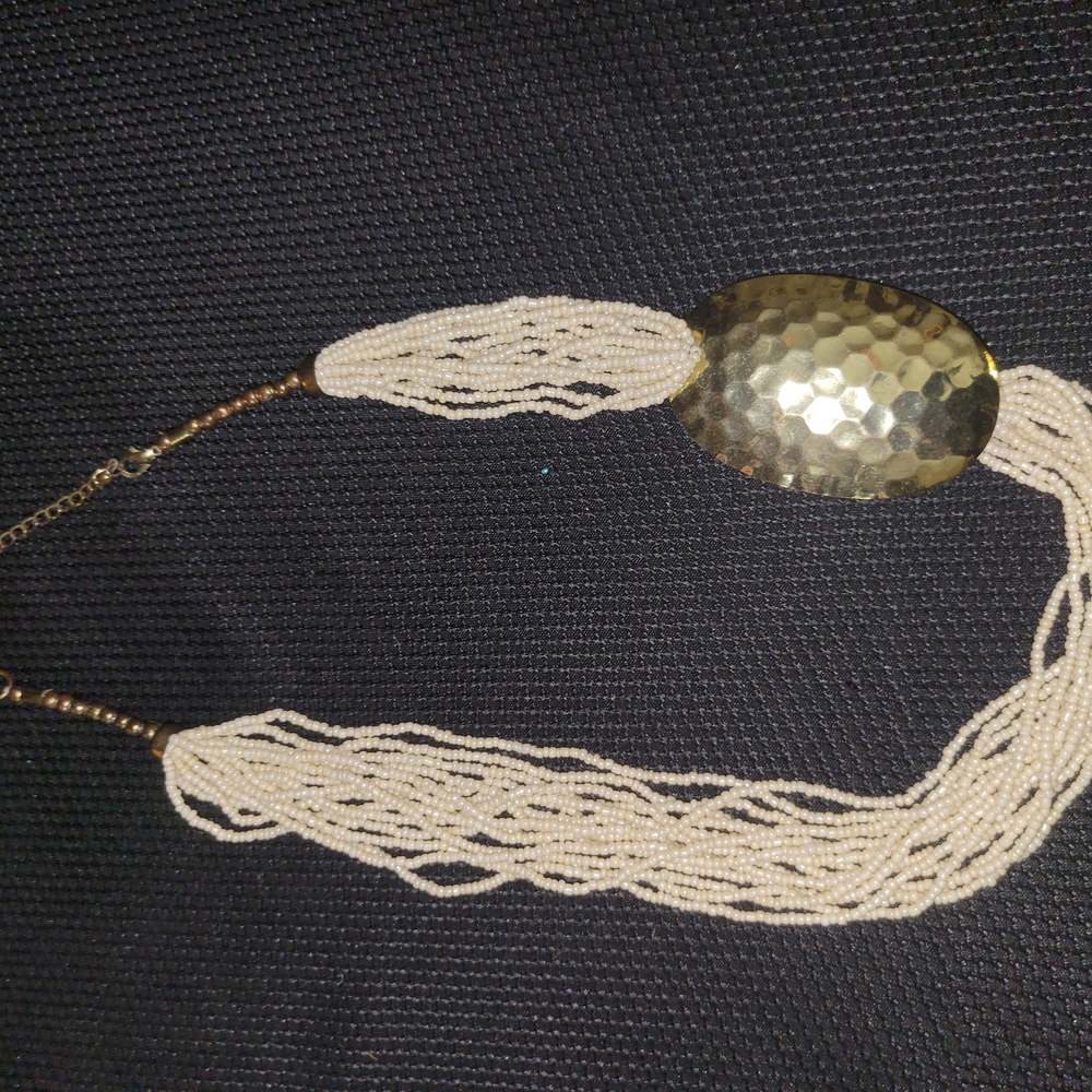 Elegant Gold and Cream Necklace